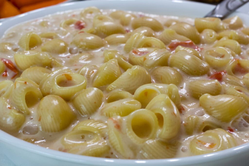 Very close up of a bowl of Queso Blanco Mac and Cheese.