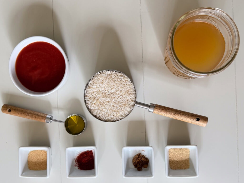 All of the ingredients measured out and ready to make the Spanish rice recipe.