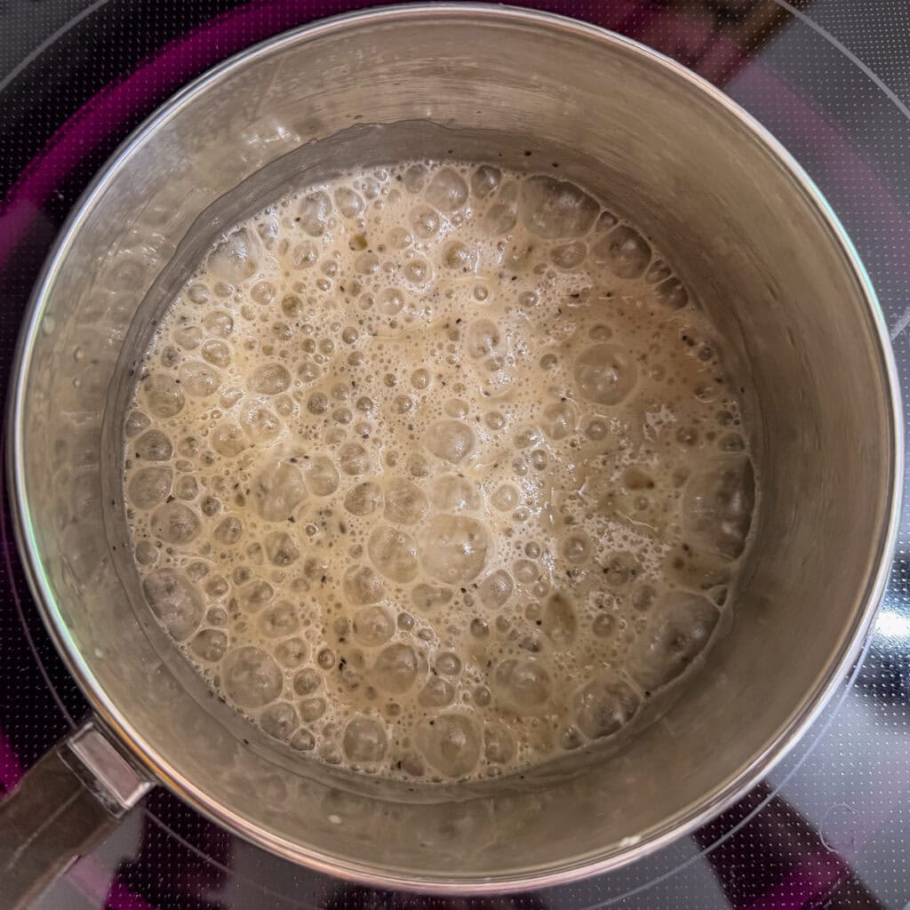 The bubbly oil, flour, salt and pepper in a small saucepan.