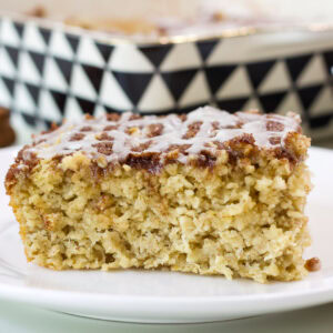 Very close up of one piece of cinnamon roll baked oatmeal so the tender inside is visible.