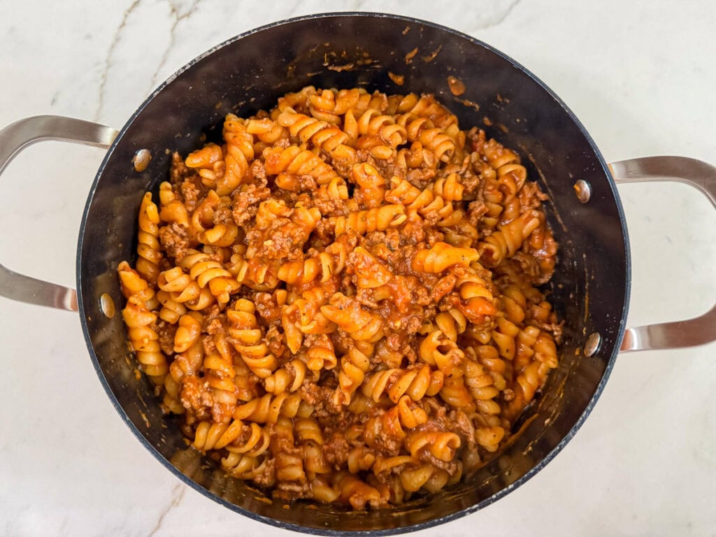 The ingredients in the pan after it has been simmered and soaked up all the liquid.