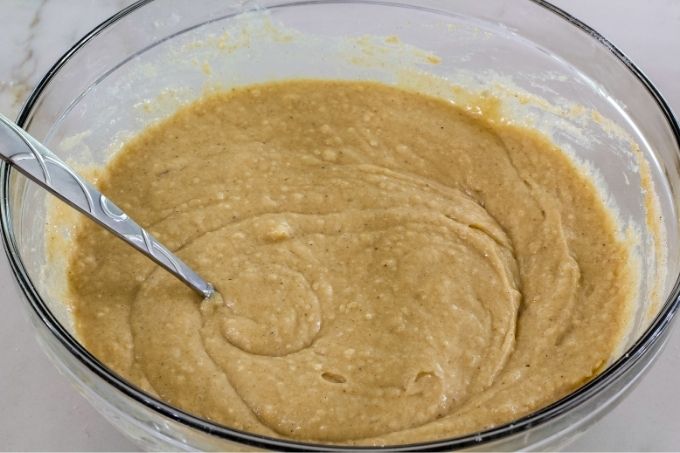 The cake batter mixed in a bowl ready to go into the pan.