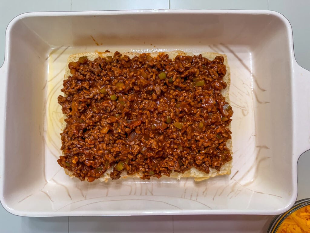 The sloppy joe mixture spread over the bottom of the rolls.